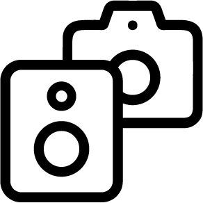 A black & white icon showing a speaker at the front and a camera from behind and to the right.